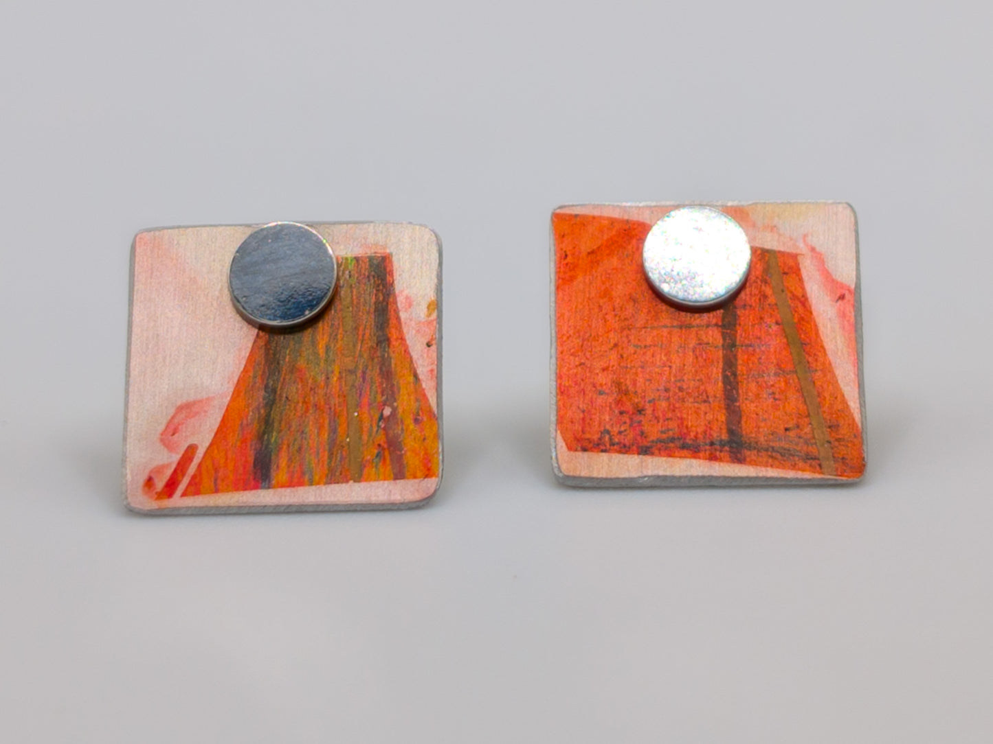 Orange and silver 2 in 1 studs